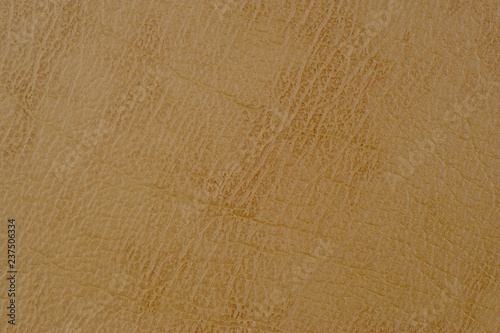 Close-up of natural grain cow leather Light brown leather texture surface.