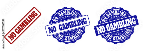 NO GAMBLING scratched stamp seals in red and blue colors. Vector NO GAMBLING labels with scratced style. Graphic elements are rounded rectangles, rosettes, circles and text labels.