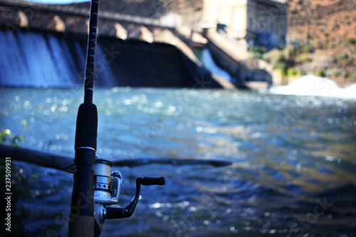 Fishing Gear on river next to dam photo