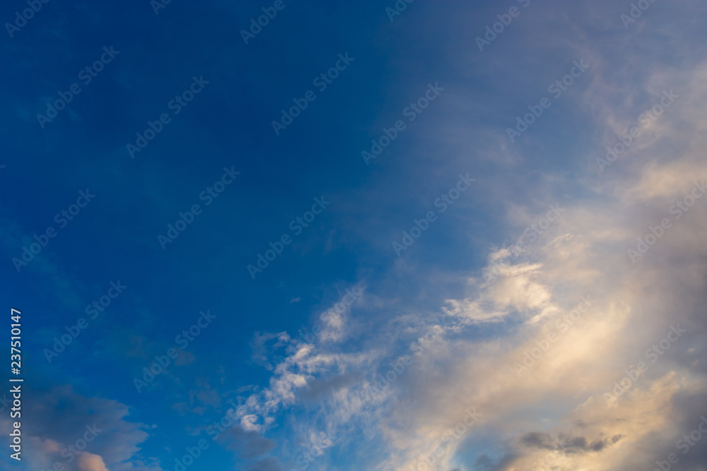Obraz premium Clouds after rain before sunset as a background