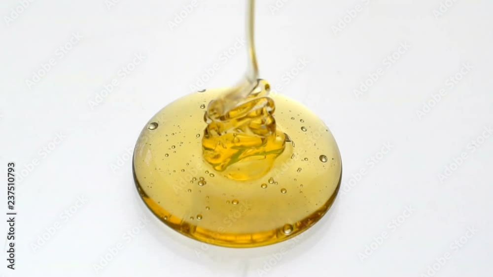 Pouring honey. Macro shot of honey dripping in slow motion, Part 2
Pouring honey. Macro shot of honey dripping in slow motion, Part 2