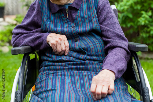 Paralyzed elderly lady
