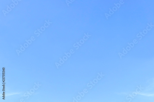Blue sky with white clouds background. Air clouds in the beautiful sky.