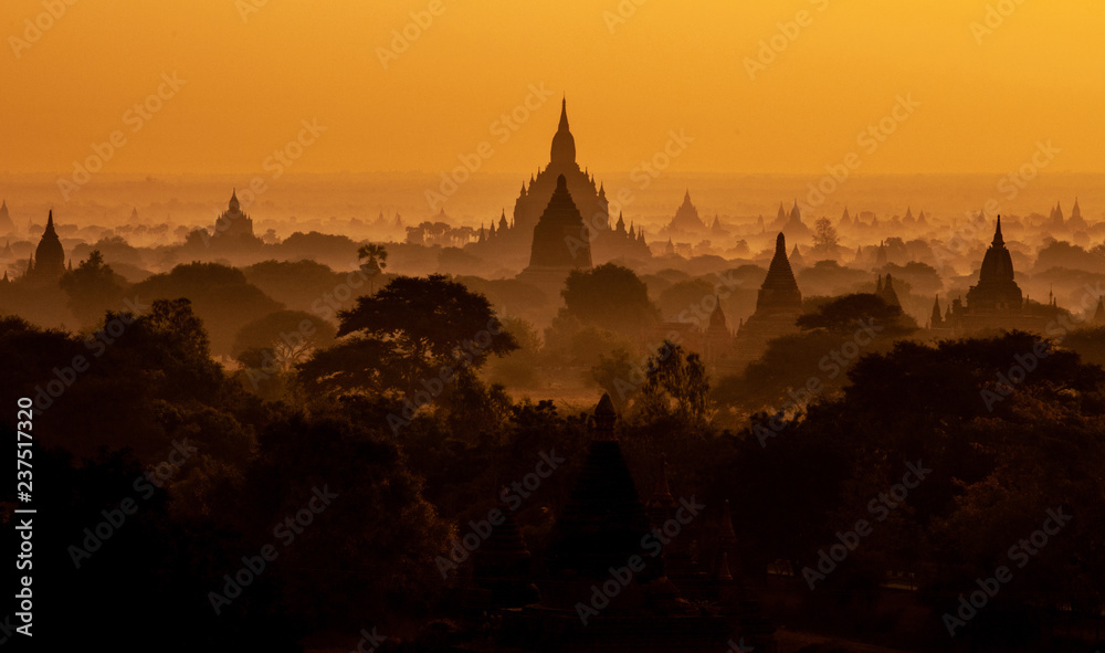 Amazing sunrise with the ancient architecture of a thousand Pagodas in Bagan Kingdom, Myanmar