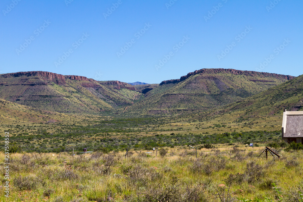 The arid landscape of the Karoo National Park in South Africa.