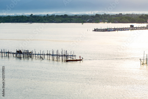 Fototapeta Naklejka Na Ścianę i Meble -  Sunrise Fish farms, Fish cages at The estuary Laem Sing, Chanthaburi ,Thailand.