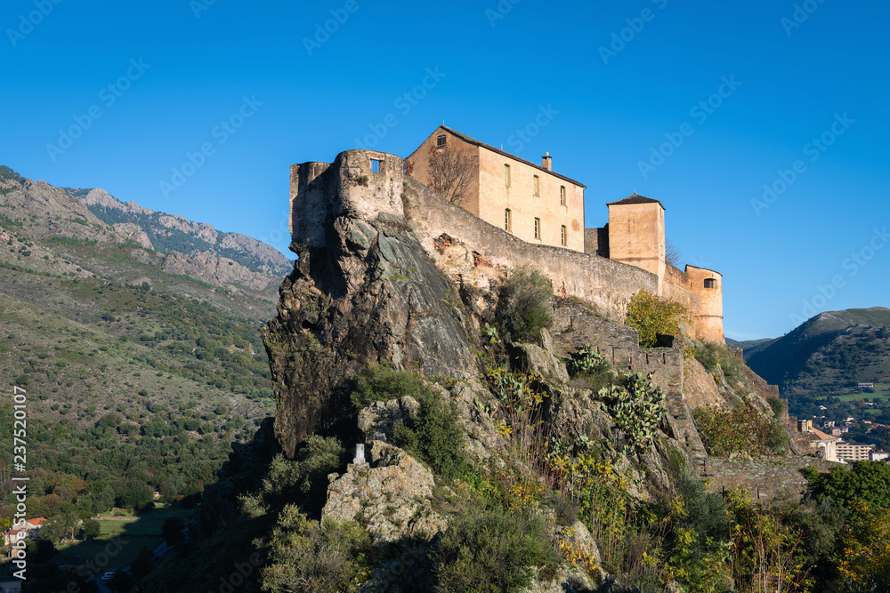 View of the famous historical fortress in the Corsican city of Corte on a sunny autumn day, France