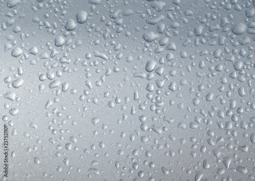 Wallpaper Mural Dew droplets  twinkle on car's rar window. Condensation on the outside of a sillvercar in early cold morning hours. Torontodigital.ca