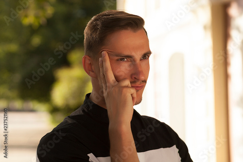 Tableau sur toile portrait of a serious young man