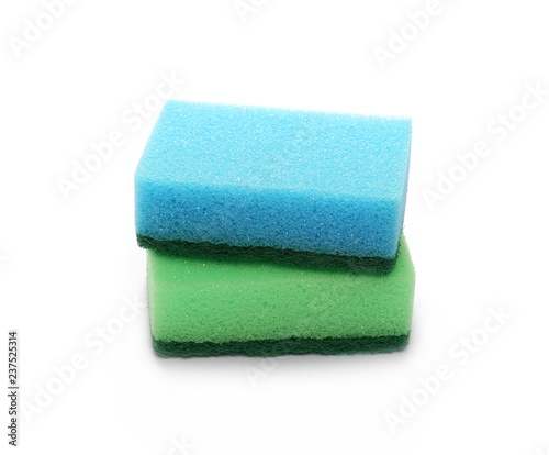 Green and blue sponges isolated on white background