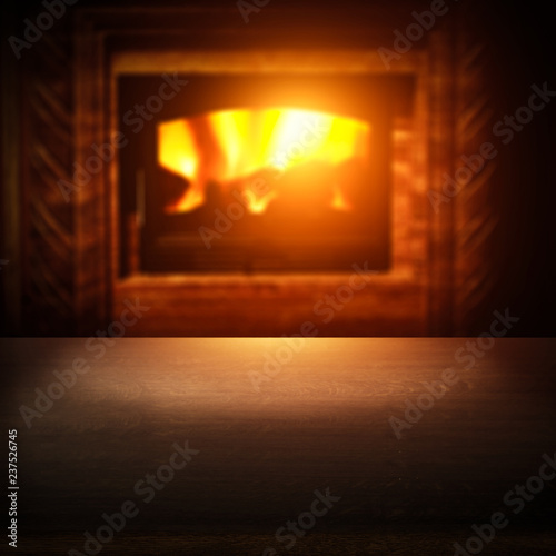 Table background of free space for your decoration and fireplace 