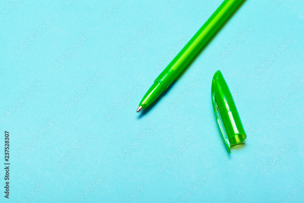 pencil on a blue table top view, office desktop, office supplies pencil on a blue table top view, office desktop, office supplies