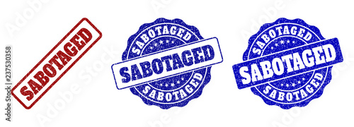 SABOTAGED grunge stamp seals in red and blue colors. Vector SABOTAGED marks with grunge style. Graphic elements are rounded rectangles, rosettes, circles and text titles.