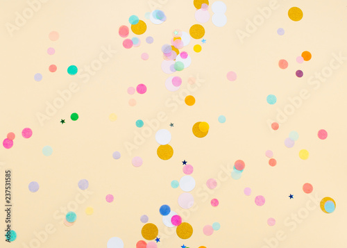 Fototapeta Naklejka Na Ścianę i Meble -  Colored confetti on yellow background
