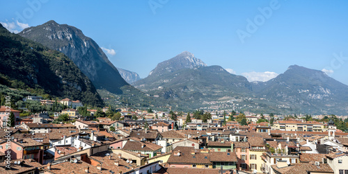 View over the roofs of Riva with mountains in the background
