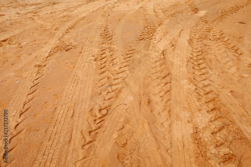 Tire tracks on the sand © srckomkrit