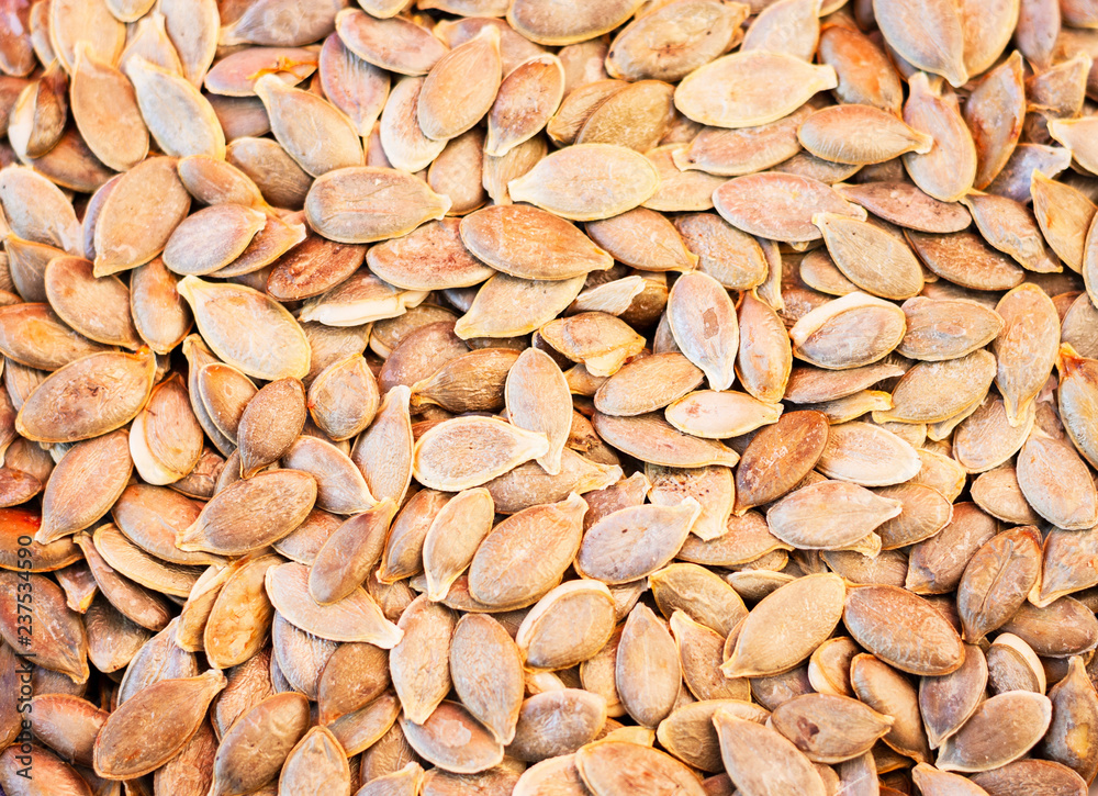 Pumpkin seeds without Husk close up – copy space for text Pumpkin seeds without Husk close up – copy space for text
