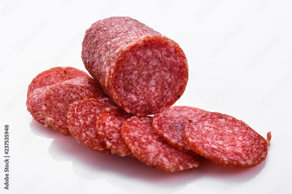 delicious sliced salami on a white background delicious sliced salami on a white background