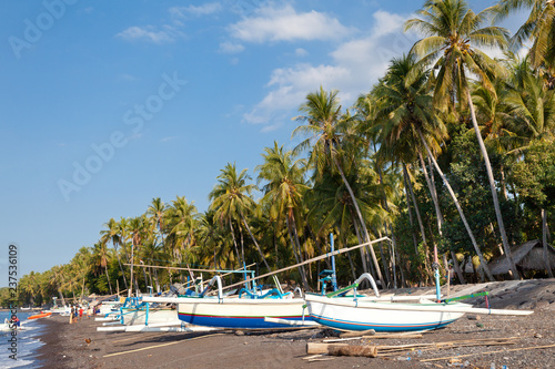 Fishing boats on the shore. Coast of Bali.