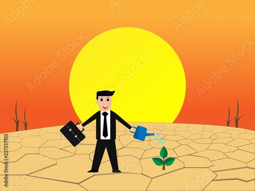 businessman watering to make the tree grow and reclaim the soil.The lack of fertile soil causes the trees to die and the soil is drought