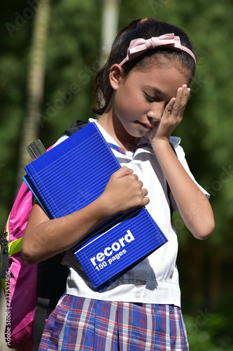 Sad Female Student With Books