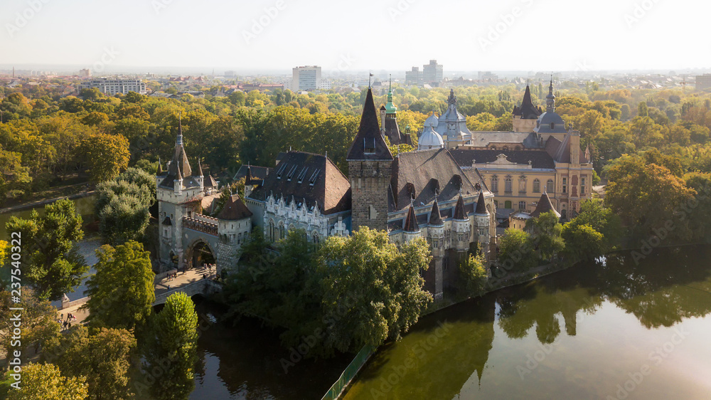 Fototapeta premium Vajdahunyad castle view from lakeside. Budapest, Hungary Filmed from the drone