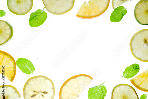 Summer refreshment drink ingredients, citrus fruit concept, Lemon, lime and mint pattern on white background, layout isolated on white
