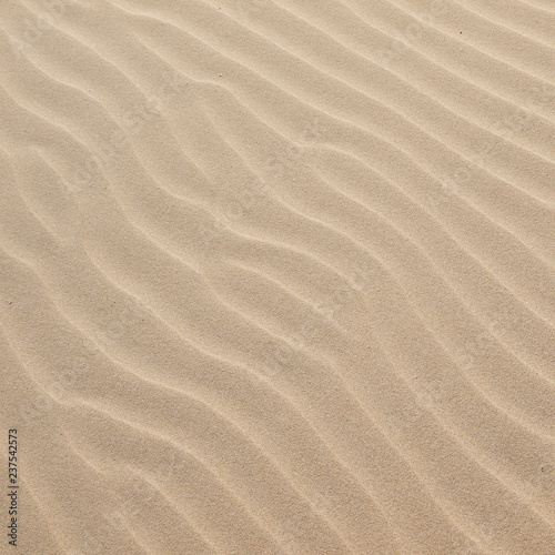 Sand texture.Dented wave of the blow of the wind © srckomkrit