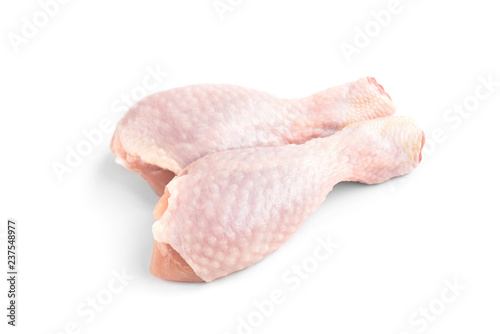 Raw chicken leg isolated on white background.