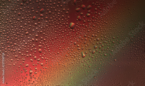 backgrounds are multicolored  water on the glass