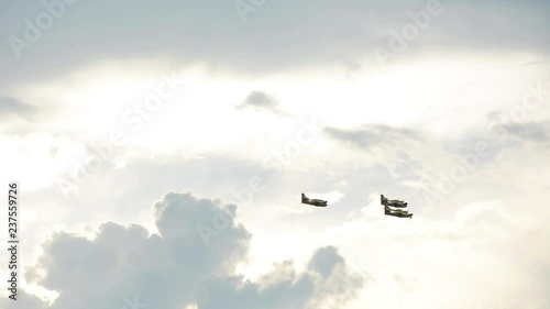 Three planes flying in the sky