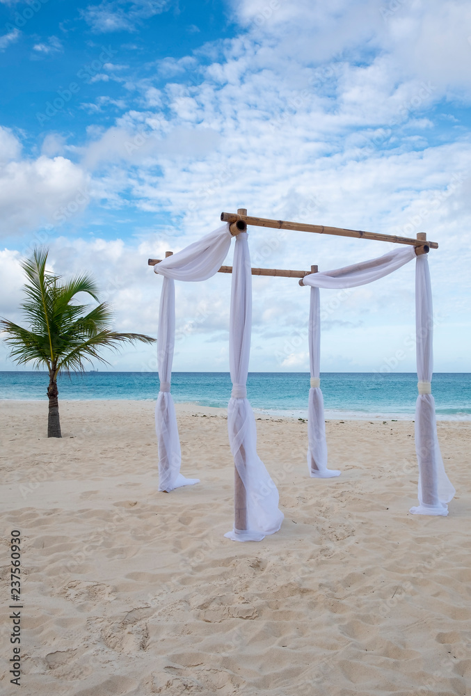 Simple Bamboo Gazebo on a Caribbean Beach Early in the Morning Simple Bamboo Gazebo on a Caribbean Beach Early in the Morning