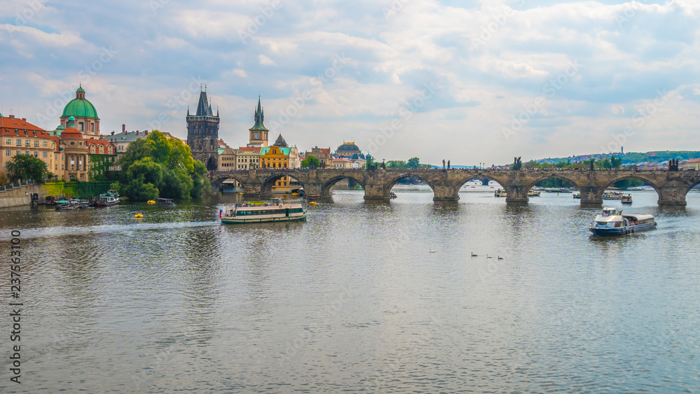 Naklejka premium View of the Old Town pier architecture and Charles Bridge over Vltava river in Prague, Czech Republic