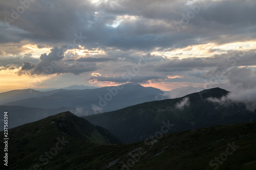 Fototapeta Naklejka Na Ścianę i Meble -  Misty weather after sunset in the Chornohora ridge