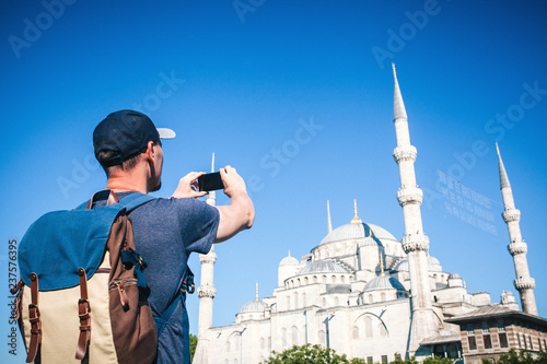 Photography Tourist photographs the Blue Mosque in Istanbul in Turkey for memory