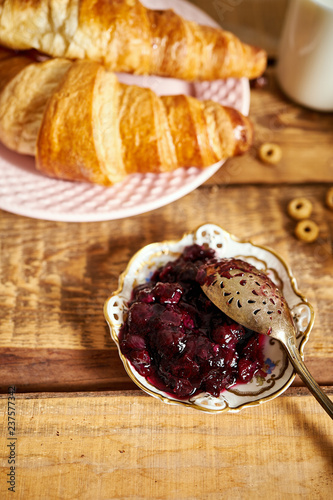 Wallpaper Mural Top view of healthy breakfast with two croissants and marmalade on an old wooden table Torontodigital.ca