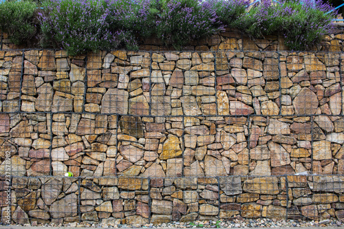 gabion wall with plands decoration outdoors  photo