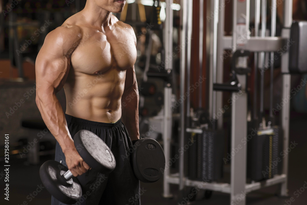 Naklejka premium Bodybuilder doing exercises