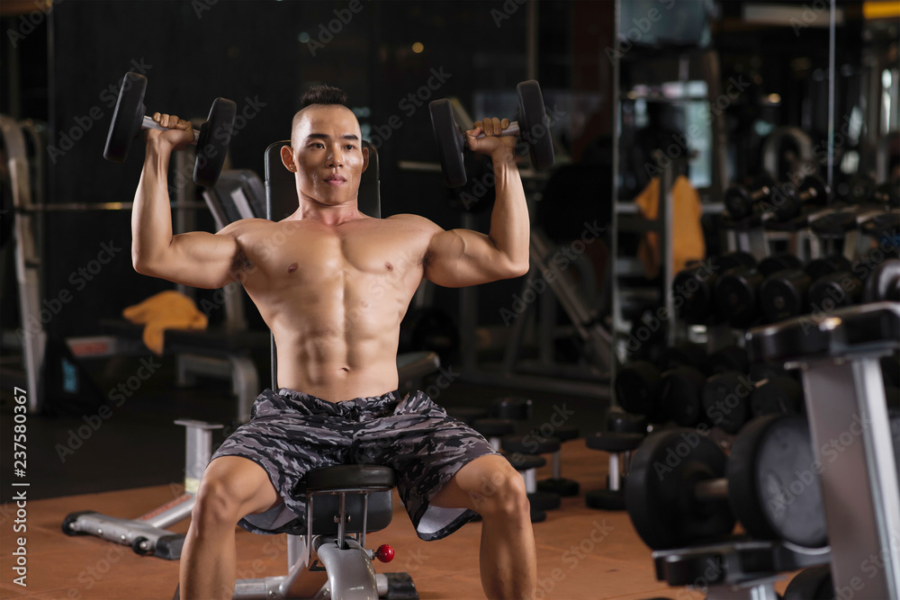 Naklejka premium Exercising strong man