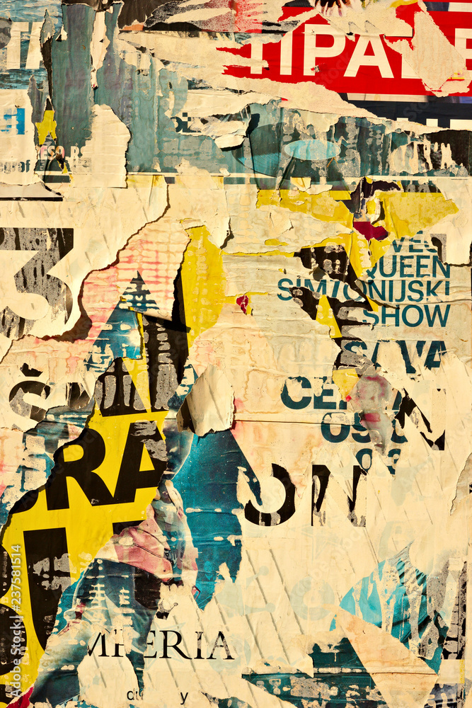 Fototapeta premium Old grunge ripped torn vintage collage posters creased crumpled paper surface placard texture background backdrop