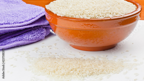 Bowl of rice and kitchen towel