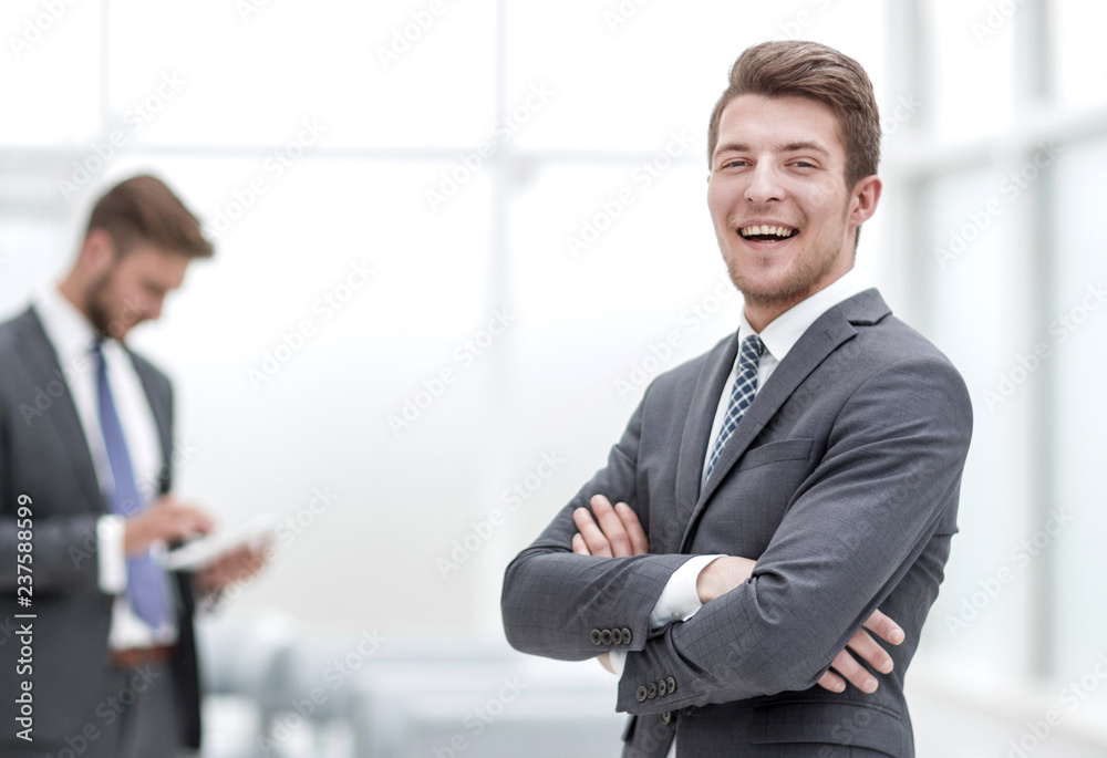 successful businessman on the background of the office successful businessman on the background of the office