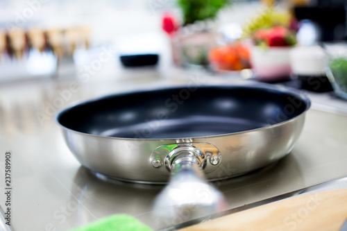 Obraz na płótnie Pan on a modern cooker. Selective focus