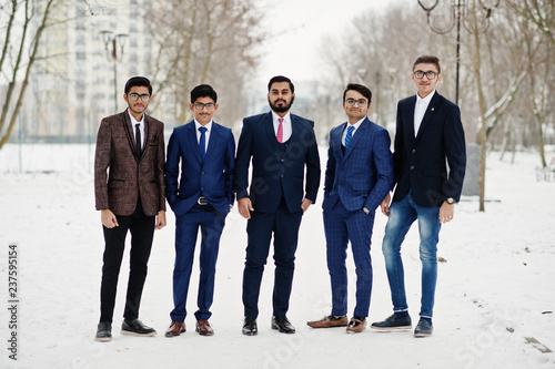 Group of five indian businessman in suits posed outdoor in winter day at Europe. © AS Photo Family