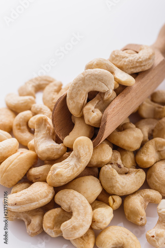 cashew nuts on a white acrylic background