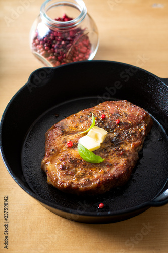 Food concept grilled Marinat Sirloin meat steak in Cast-Iron Skillet pan with copy space