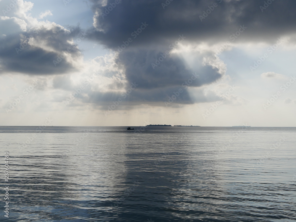 Beautiful Cumulus clouds over the ocean in Maldives