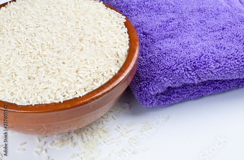 Bowl of rice and kitchen towel detail