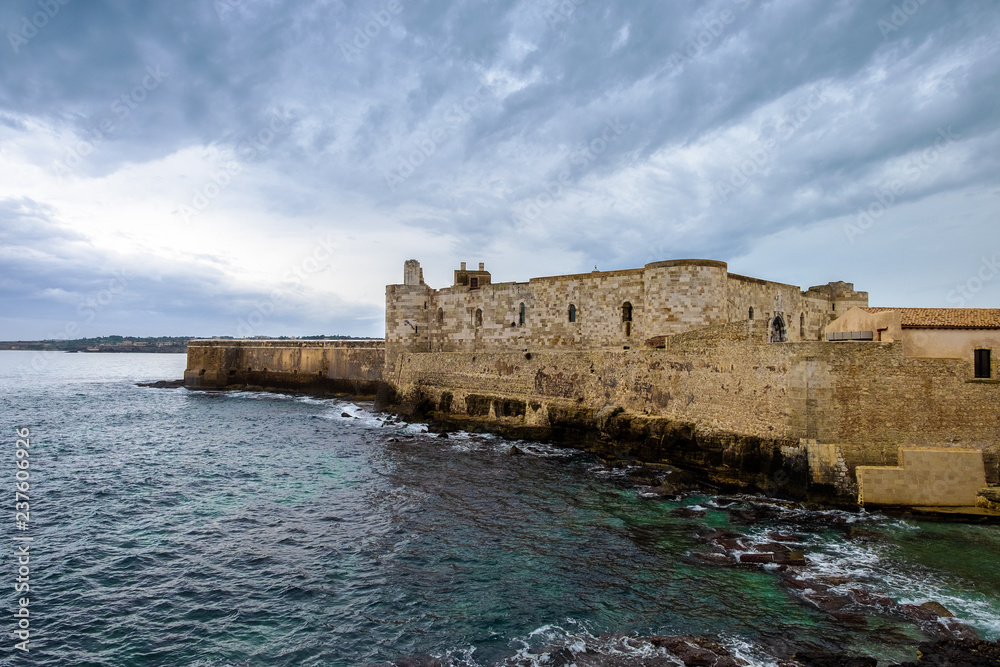 Middle Aged Maniace Castle on seacoast in the island of Ortigia, Siracusa.