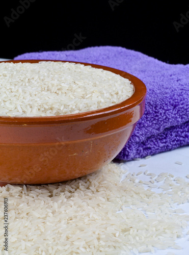 Bowl of rice and kitchen towel detail